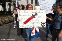New York,  12,000 N.Y.C.  Municipal employees (police,fire,sanitation,teachers) protest  the  
Mandate to get vaccinated by October 29, 2021 or be put on unpaid leave. The protesters walked across the Brooklyn Bridge to City Hall.
