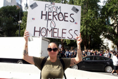 New York,  12,000 N.Y.C.  Municipal employees (police,fire,sanitation,teachers) protest  the  
Mandate to get vaccinated by October 29, 2021 or be put on unpaid leave. The protesters walked across the Brooklyn Bridge to City Hall.
