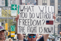 New York,  12,000 N.Y.C.  Municipal employees (police,fire,sanitation,teachers) protest  the  
Mandate to get vaccinated by October 29, 2021 or be put on unpaid leave. The protesters walked across the Brooklyn Bridge to City Hall.