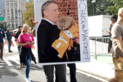 New York,  12,000 N.Y.C.  Municipal employees (police,fire,sanitation,teachers) protest  the  
Mandate to get vaccinated by October 29, 2021 or be put on unpaid leave. The protesters walked across the Brooklyn Bridge to City Hall.