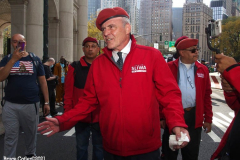 New York,  12,000 N.Y.C.  Municipal employees (police,fire,sanitation,teachers) protest  the  
Mandate to get vaccinated by October 29, 2021 or be put on unpaid leave. The protesters walked across the Brooklyn Bridge to City Hall. Curtis Sliwa the head of the group The Guardian Angels joins the protest to show support he is also running for New York City Mayor