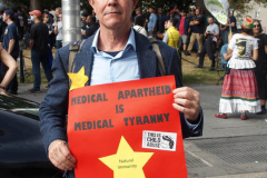 New York,  12,000 N.Y.C.  Municipal employees (police,fire,sanitation,teachers) protest  the  
Mandate to get vaccinated by October 29, 2021 or be put on unpaid leave. The protesters walked across the Brooklyn Bridge to City Hall.