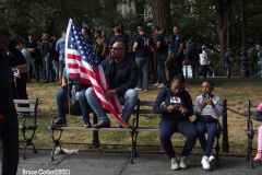 New York,  12,000 N.Y.C.  Municipal employees (police,fire,sanitation,teachers) protest  the  
Mandate to get vaccinated by October 29, 2021 or be put on unpaid leave. The protesters walked across the Brooklyn Bridge to City Hall.
