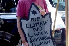Group of observant jews protest in front of United States Senator Charles Schumer's apartment building on the eve of the Holiest of jewish holidays Yom Kippur. The protestors want him to try and delay the confirmation hearing for Supreme court justice until after the election. Some protestors blow the ceremonial shofar (Rams Horn).