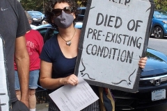 Group of observant jews protest in front of United States Senator Charles Schumer's apartment building on the eve of the Holiest of jewish holidays Yom Kippur. The protestors want him to try and delay the confirmation hearing for Supreme court justice until after the election. Some protestors blow the ceremonial shofar (Rams Horn).
