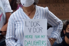 Group of observant jews protest in front of United States Senator Charles Schumer's apartment building on the eve of the Holiest of jewish holidays Yom Kippur. The protestors want him to try and delay the confirmation hearing for Supreme court justice until after the election. Some protestors blow the ceremonial shofar (Rams Horn).