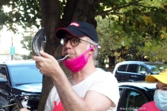 Group of observant jews protest in front of United States Senator Charles Schumer's apartment building on the eve of the Holiest of jewish holidays Yom Kippur. The protestors want him to try and delay the confirmation hearing for Supreme court justice until after the election. Some protestors blow the ceremonial shofar (Rams Horn).