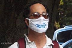 Group of observant jews protest in front of United States Senator Charles Schumer's apartment building on the eve of the Holiest of jewish holidays Yom Kippur. The protestors want him to try and delay the confirmation hearing for Supreme court justice until after the election. Some protestors blow the ceremonial shofar (Rams Horn).