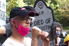 Group of observant jews protest in front of United States Senator Charles Schumer's apartment building on the eve of the Holiest of jewish holidays Yom Kippur. The protestors want him to try and delay the confirmation hearing for Supreme court justice until after the election. Some protestors blow the ceremonial shofar (Rams Horn).