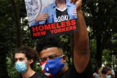 New York,   Housing Works inc. Advocacy group holds a rally and civil disobedience by laying down and blocking Broadway in front of City Hall. New York City Police Department officers arrested 9 people.