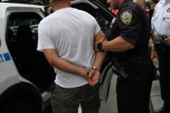 New York,   Housing Works inc. Advocacy group holds a rally and civil disobedience by laying down and blocking Broadway in front of City Hall. New York City Police Department officers arrested 9 people.