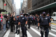 New York,   Housing Works inc. Advocacy group holds a rally and civil disobedience by laying down and blocking Broadway in front of City Hall. New York City Police Department officers arrested 9 people.