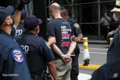 New York,   Housing Works inc. Advocacy group holds a rally and civil disobedience by laying down and blocking Broadway in front of City Hall. New York City Police Department officers arrested 9 people.