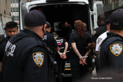 New York,   Housing Works inc. Advocacy group holds a rally and civil disobedience by laying down and blocking Broadway in front of City Hall. New York City Police Department officers arrested 9 people.
