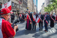 Polish-Americans gathered by the thousands in Midtown Manhattan, to celebrate the 84th Pulaski Day Parade, commemorating and honoring General Casimir Pulaski a Polish born aristocrat who is revered and remembered as both a Polish and an American Revolutionary War Hero, fighting for freedom in his homeland and adopted nation.
Polish government and prominent local community figures came to celebrate the abundance of festivities and events that took place, marching up 5th ave from 36th to 53rd St. 
This year, the theme spotlighted the 100th Birthday Anniversary of Pope John Paul II who was born in Wadowice, Poland. 
(C) Bianca Otero, NYC, NY. October 3, 2021.