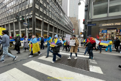 Protests arose in several parts of the city, where an estimated 500+ demonstrators marched from Times Square to the Permanent Mission of the Russian Federation. They then marched along Lexington Avenue to the United Nations, located within Dag Hammarskjold Plaza on East 47th Street in Manhattan. 

Among their chants, they shouted "hands off Ukraine," "stop Russia now," "stand with Ukraine," and "support Ukraine." Some also sang the Ukrainian national anthem. 

Photographer Placido D. Perez
NYPPA Independent Photographer