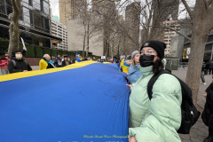 Protests arose in several parts of the city, where an estimated 500+ demonstrators marched from Times Square to the Permanent Mission of the Russian Federation. They then marched along Lexington Avenue to the United Nations, located within Dag Hammarskjold Plaza on East 47th Street in Manhattan. 

Among their chants, they shouted "hands off Ukraine," "stop Russia now," "stand with Ukraine," and "support Ukraine." Some also sang the Ukrainian national anthem. 

Photographer Placido D. Perez
NYPPA Independent Photographer