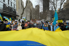 Protests arose in several parts of the city, where an estimated 500+ demonstrators marched from Times Square to the Permanent Mission of the Russian Federation. They then marched along Lexington Avenue to the United Nations, located within Dag Hammarskjold Plaza on East 47th Street in Manhattan. 

Among their chants, they shouted "hands off Ukraine," "stop Russia now," "stand with Ukraine," and "support Ukraine." Some also sang the Ukrainian national anthem. 

Photographer Placido D. Perez
NYPPA Independent Photographer