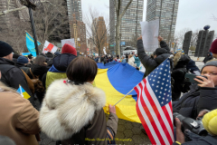 Protests arose in several parts of the city, where an estimated 500+ demonstrators marched from Times Square to the Permanent Mission of the Russian Federation. They then marched along Lexington Avenue to the United Nations, located within Dag Hammarskjold Plaza on East 47th Street in Manhattan. 

Among their chants, they shouted "hands off Ukraine," "stop Russia now," "stand with Ukraine," and "support Ukraine." Some also sang the Ukrainian national anthem. 

Photographer Placido D. Perez
NYPPA Independent Photographer