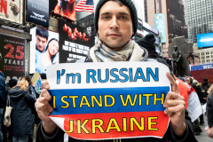 February 24, 2022 - New York, NY, United States: Man with a sign with the words "I'm Russian I stand with Ukraine" at a "Stop Putin" rally organized as a response to the war in Ukraine.