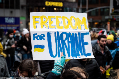February 24, 2022 - New York, NY, United States: Demonstrator with a sign with the words "Freedom for Ukraine" at a "Stop Putin" rally organized as a response to the war in Ukraine.