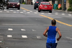 Photographs by Mary DiBiase Blaich
Sunday, July 04, 2021
Forest Avenue
West Brighton, Staten Island
Happy Fourth of July!
For over 35 years, the Blaich Family has spent the early morning hours on the Fourth handing out water to runners in the annual Pepper Martin 5 Mile Race later renamed for Arielle Newman. Last year the race was cancelled, but a small group of local runners staged their own competition. This year they did the same. No permits were issued,which meant the traffic was not stopped, so the runners made their way on Forest Avenue either on the sidewalk or the street, dodging cars. The official sponsor was the Correcaminos group of runners.