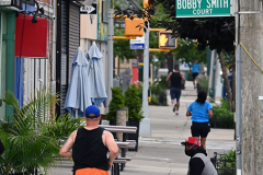 Photographs by Mary DiBiase Blaich
Sunday, July 04, 2021
Forest Avenue
West Brighton, Staten Island
Happy Fourth of July!
For over 35 years, the Blaich Family has spent the early morning hours on the Fourth handing out water to runners in the annual Pepper Martin 5 Mile Race later renamed for Arielle Newman. Last year the race was cancelled, but a small group of local runners staged their own competition. This year they did the same. No permits were issued,which meant the traffic was not stopped, so the runners made their way on Forest Avenue either on the sidewalk or the street, dodging cars. The official sponsor was the Correcaminos group of runners.