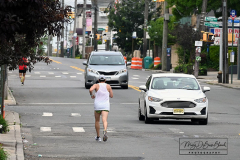 Photographs by Mary DiBiase Blaich
Sunday, July 04, 2021
Forest Avenue
West Brighton, Staten Island
Happy Fourth of July!
For over 35 years, the Blaich Family has spent the early morning hours on the Fourth handing out water to runners in the annual Pepper Martin 5 Mile Race later renamed for Arielle Newman. Last year the race was cancelled, but a small group of local runners staged their own competition. This year they did the same. No permits were issued,which meant the traffic was not stopped, so the runners made their way on Forest Avenue either on the sidewalk or the street, dodging cars. The official sponsor was the Correcaminos group of runners.