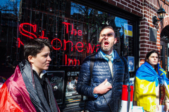 Ukranian and LGBTQ supporters came together in front of the Stonewall Inn, to speak in protest on their opposition of the Russian attack on Ukraine. 38 Christopher street is home of the 1969 Stonewall Uprising, which paved the way for LGBTQ rights and pushed the movement into existence. 
Though not illegal in Russia, there are no anti-discrimination protections of LGBTQ people nor does it prohibit hate crimes based on sexual orientation and gender identity.
Chelsea, Manhattan, New York. Saturday, February 26, 2022. (C) Bianca Otero