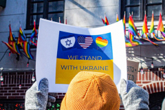 Ukranian and LGBTQ supporters came together in front of the Stonewall Inn, to speak in protest on their opposition of the Russian attack on Ukraine. 38 Christopher street is home of the 1969 Stonewall Uprising, which paved the way for LGBTQ rights and pushed the movement into existence. 
Though not illegal in Russia, there are no anti-discrimination protections of LGBTQ people nor does it prohibit hate crimes based on sexual orientation and gender identity.
Chelsea, Manhattan, New York. Saturday, February 26, 2022. (C) Bianca Otero