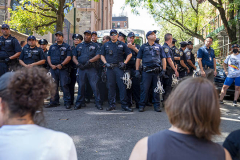 NEW YORK, NY - AUGUST 6: New York Police Department officers protect a police van after pro-abortion protesters were arrested outside of a Catholic church in downtown Manhattan on August 6, 2022 in New York City. The protests occurred  at the Basilica of St. Patricks Old Cathedral are where a small number of anti-abortion activists worship. Five pro-abortion rights protesters were arrested today by the New York Police Department. (Photo by Robert Nickelsberg/Getty Images)