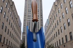 Find Claes Oldenburg and Coosje van Bruggen's Plantoir Blue at the Fifth Avenue entrance to the Channel Gardens at Rockefeller Center. The sculpture is will be display from March 18th to May 6th.

Husband-and-wife team Oldenburg and van Bruggen are celebrated for their large-scale sculptures of ordinary objects that take pleasure in the forms found in everyday life. Delving into the fruit bowl, the toolshed and the toybox for familiar shapes and colors, the artists enlarged and animated their selected objects, fixing them in moments of energetic motion. Plantoir is a humble gardening tool that stands upright, its point submerged in the ground as if it had just fallen out of the sky.
