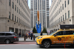 Find Claes Oldenburg and Coosje van Bruggen's Plantoir Blue at the Fifth Avenue entrance to the Channel Gardens at Rockefeller Center. The sculpture is will be display from March 18th to May 6th.

Husband-and-wife team Oldenburg and van Bruggen are celebrated for their large-scale sculptures of ordinary objects that take pleasure in the forms found in everyday life. Delving into the fruit bowl, the toolshed and the toybox for familiar shapes and colors, the artists enlarged and animated their selected objects, fixing them in moments of energetic motion. Plantoir is a humble gardening tool that stands upright, its point submerged in the ground as if it had just fallen out of the sky.
