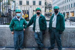 The keepers and maintainers of the Rockefeller Christmas Tree stand before the posting of the tree.

The Rockefeller Christmas Tree arrived at Rockefeller Plaza, Manhattan, NYC on the morning of November 13, 2021. 
Spectators flocked to watch the spectacle as well as those involved in the assembly and press after last year’s event was restricted due to COVID.
The impressive 12 ton and 85 year old tree is a Norway Spruce, donated by the PRICE family from Elkton, Maryland. This is the first Maryland tree that has ever been chosen in this tradition as the Rockefeller Center Tree.
 (C) Bianca Otero. NYC. November 13, 2021.