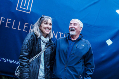 Devon and Julie Price, donators of this year’s Rockefeller Christmas Tree stand with tree.
The Rockefeller Christmas Tree arrived at Rockefeller Plaza, Manhattan, NYC on the morning of November 13, 2021. 
Spectators flocked to watch the spectacle as well as those involved in the assembly and press after last year’s event was restricted due to COVID.
The impressive 12 ton and 85 year old tree is a Norway Spruce, donated by the Price Family from Elkton, Maryland. This is the first Maryland tree that has ever been chosen in this tradition as the Rockefeller Center Tree.
 (C) Bianca Otero. NYC. November 13, 2021.