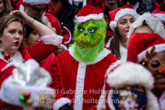 The Grinch helps kicks off Santa Con NYC 2021 on Broadway in New York, NY, on Dec. 11, 2021. (Photo by Gabriele Holtermann/Sipa USA)