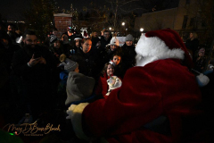 Santa visits Forest Avenue
Forest Avenue BID
Thursday, December 09. 2021
West Brighton
Staten Island, NY
For Credit:  Mary DiBiase Blaich

Santa Claus came to West Brighton on Thursday, December 9, 2021 sponsored by  the Forest Avenue BID.  The concept was to bring cheer to the commercial area.  Santa rode a horse drawn carriage (the reindeer were resting up for Christmas Eve), ran a few red lights and tossed chocolate candy to the many gathered on the sidewalks. Many store windows displayed seasonal decorations.