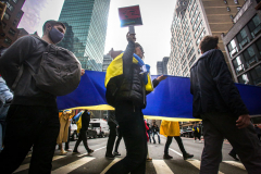 Stimulated by the recent bombings of Mariupol and the children killed and orphans left at risk,, Razom for Ukraine and Ukrainian Jersey City organized a peaceful protest in NYC and major cities in the US.
Starting in Midtown at the UNICEF offices to Fox News then ending in Times Square, the peaceful march of several hundred chanted “Save our Children” and “Putin is a Killer”. People from the local community as well as other neighboring countries came to protest and speak in the final part of the March. Manhattan, NY. March 18, 2022. (C) Bianca Otero