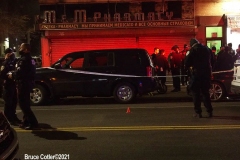 New York-  person shot on the conner of East 19th Street and Avenue M. in the Midwood section of Brooklyn. Police from the 70th precinct investigate the shooting. Red markers indicate where shell casing lay on the ground.