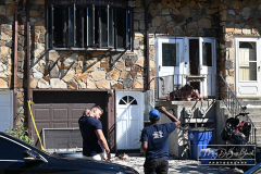 Fire with Firefighter Critical
77 Gary Court
Staten Island
Saturday, August 13, 2022
Photographs by:
Mary DiBiase Blaich 

The morning after a fire at 77 Gary Court on Friday evening left a firefighter in critical condition investigators and cleanup crews were on site.  One resident of the townhome was rescued from the third floor.  The FDNY firefighter is from Ladder 166, and was removed to Staten Island University Hospital.
