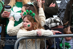 Staten Island St Patrick’s Day Parade
Sunday, March 06, 2022
Foret Avenue
West Brighton, Staten Island, NY
For Credit:  Mary DiBiase Blaich

The annual St Patrick’s Day Parade returned to Staten Island after a covid absence last year.  Controversy surrounded the event with the decision by the parade organizers to not allow LGBTQ groups to march.  The banned groups held a press conference prior to the parade.  In conduction with the parade, there is always a one mile race that precedes the parade.  It went on, but many racers ran in a second race in support of the banned groups.  
The weather was warm, but mixed with clouds, rain and sun.  Only two elected officials participated… Boro President Vito Fossella in a bright green sweater, and Congresswoman Nicole Malliotakis in a green Ireland sweater.