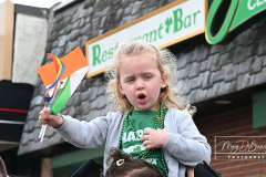 Staten Island St Patrick’s Day Parade
Sunday, March 06, 2022
Foret Avenue
West Brighton, Staten Island, NY
For Credit:  Mary DiBiase Blaich

The annual St Patrick’s Day Parade returned to Staten Island after a covid absence last year.  Controversy surrounded the event with the decision by the parade organizers to not allow LGBTQ groups to march.  The banned groups held a press conference prior to the parade.  In conduction with the parade, there is always a one mile race that precedes the parade.  It went on, but many racers ran in a second race in support of the banned groups.  
The weather was warm, but mixed with clouds, rain and sun.  Only two elected officials participated… Boro President Vito Fossella in a bright green sweater, and Congresswoman Nicole Malliotakis in a green Ireland sweater.
