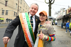 Staten Island St Patrick’s Day Parade
Sunday, March 06, 2022
Foret Avenue
West Brighton, Staten Island, NY
For Credit:  Mary DiBiase Blaich

The annual St Patrick’s Day Parade returned to Staten Island after a covid absence last year.  Controversy surrounded the event with the decision by the parade organizers to not allow LGBTQ groups to march.  The banned groups held a press conference prior to the parade.  In conduction with the parade, there is always a one mile race that precedes the parade.  It went on, but many racers ran in a second race in support of the banned groups.  
The weather was warm, but mixed with clouds, rain and sun.  Only two elected officials participated… Boro President Vito Fossella in a bright green sweater, and Congresswoman Nicole Malliotakis in a green Ireland sweater.