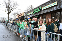 Staten Island St Patrick’s Day Parade
Sunday, March 06, 2022
Foret Avenue
West Brighton, Staten Island, NY
For Credit:  Mary DiBiase Blaich

The annual St Patrick’s Day Parade returned to Staten Island after a covid absence last year.  Controversy surrounded the event with the decision by the parade organizers to not allow LGBTQ groups to march.  The banned groups held a press conference prior to the parade.  In conduction with the parade, there is always a one mile race that precedes the parade.  It went on, but many racers ran in a second race in support of the banned groups.  
The weather was warm, but mixed with clouds, rain and sun.  Only two elected officials participated… Boro President Vito Fossella in a bright green sweater, and Congresswoman Nicole Malliotakis in a green Ireland sweater.