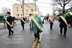 Staten Island St Patrick’s Day Parade
Sunday, March 06, 2022
Foret Avenue
West Brighton, Staten Island, NY
For Credit:  Mary DiBiase Blaich

The annual St Patrick’s Day Parade returned to Staten Island after a covid absence last year.  Controversy surrounded the event with the decision by the parade organizers to not allow LGBTQ groups to march.  The banned groups held a press conference prior to the parade.  In conduction with the parade, there is always a one mile race that precedes the parade.  It went on, but many racers ran in a second race in support of the banned groups.  
The weather was warm, but mixed with clouds, rain and sun.  Only two elected officials participated… Boro President Vito Fossella in a bright green sweater, and Congresswoman Nicole Malliotakis in a green Ireland sweater.