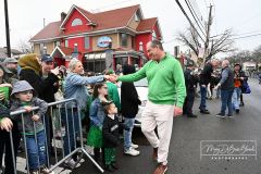 Staten Island St Patrick’s Day Parade
Sunday, March 06, 2022
Foret Avenue
West Brighton, Staten Island, NY
For Credit:  Mary DiBiase Blaich

The annual St Patrick’s Day Parade returned to Staten Island after a covid absence last year.  Controversy surrounded the event with the decision by the parade organizers to not allow LGBTQ groups to march.  The banned groups held a press conference prior to the parade.  In conduction with the parade, there is always a one mile race that precedes the parade.  It went on, but many racers ran in a second race in support of the banned groups.  
The weather was warm, but mixed with clouds, rain and sun.  Only two elected officials participated… Boro President Vito Fossella in a bright green sweater, and Congresswoman Nicole Malliotakis in a green Ireland sweater.