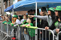 Staten Island St Patrick’s Day Parade
Sunday, March 06, 2022
Foret Avenue
West Brighton, Staten Island, NY
For Credit:  Mary DiBiase Blaich

The annual St Patrick’s Day Parade returned to Staten Island after a covid absence last year.  Controversy surrounded the event with the decision by the parade organizers to not allow LGBTQ groups to march.  The banned groups held a press conference prior to the parade.  In conduction with the parade, there is always a one mile race that precedes the parade.  It went on, but many racers ran in a second race in support of the banned groups.  
The weather was warm, but mixed with clouds, rain and sun.  Only two elected officials participated… Boro President Vito Fossella in a bright green sweater, and Congresswoman Nicole Malliotakis in a green Ireland sweater.