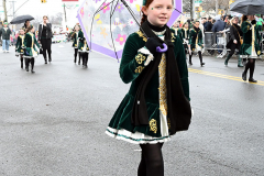 Staten Island St Patrick’s Day Parade
Sunday, March 06, 2022
Foret Avenue
West Brighton, Staten Island, NY
For Credit:  Mary DiBiase Blaich

The annual St Patrick’s Day Parade returned to Staten Island after a covid absence last year.  Controversy surrounded the event with the decision by the parade organizers to not allow LGBTQ groups to march.  The banned groups held a press conference prior to the parade.  In conduction with the parade, there is always a one mile race that precedes the parade.  It went on, but many racers ran in a second race in support of the banned groups.  
The weather was warm, but mixed with clouds, rain and sun.  Only two elected officials participated… Boro President Vito Fossella in a bright green sweater, and Congresswoman Nicole Malliotakis in a green Ireland sweater.