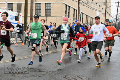 Staten Island St Patrick’s Day Parade
Sunday, March 06, 2022
Foret Avenue
West Brighton, Staten Island, NY
For Credit:  Mary DiBiase Blaich

The annual St Patrick’s Day Parade returned to Staten Island after a covid absence last year.  Controversy surrounded the event with the decision by the parade organizers to not allow LGBTQ groups to march.  The banned groups held a press conference prior to the parade.  In conduction with the parade, there is always a one mile race that precedes the parade.  It went on, but many racers ran in a second race in support of the banned groups.  
The weather was warm, but mixed with clouds, rain and sun.  Only two elected officials participated… Boro President Vito Fossella in a bright green sweater, and Congresswoman Nicole Malliotakis in a green Ireland sweater.