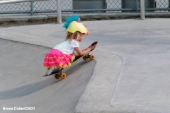 NEW YORK - Beautiful day at the skate park.
Dad teaches his daughter to skateboard while others practice BMX bike moves and more advanced skateboards show there moves.